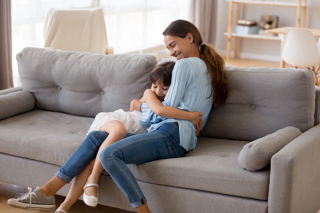 Mother and child on couch