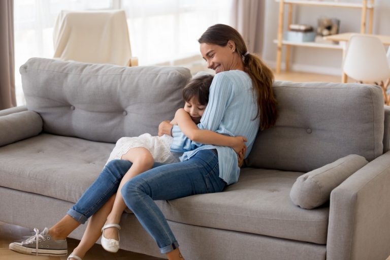 Mother and child on couch