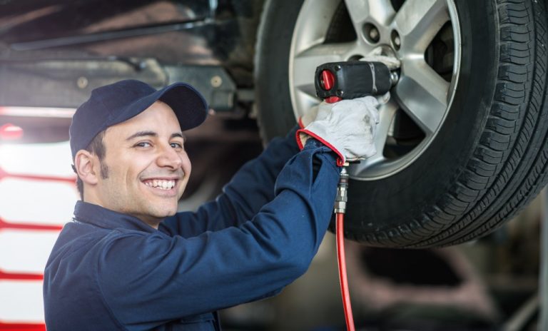 mechanic fixing the tire