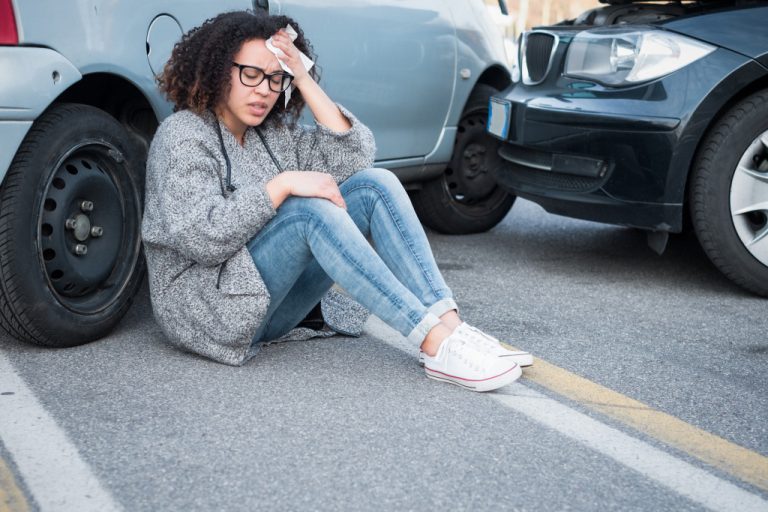 woman post car accident