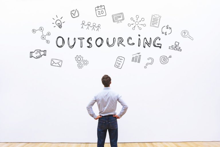 man looking at outsourcing outline