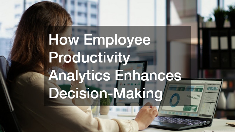 a woman looking at some data in her laptop